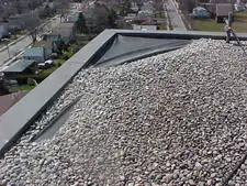 Professional inspection of a low-slope commercial roof